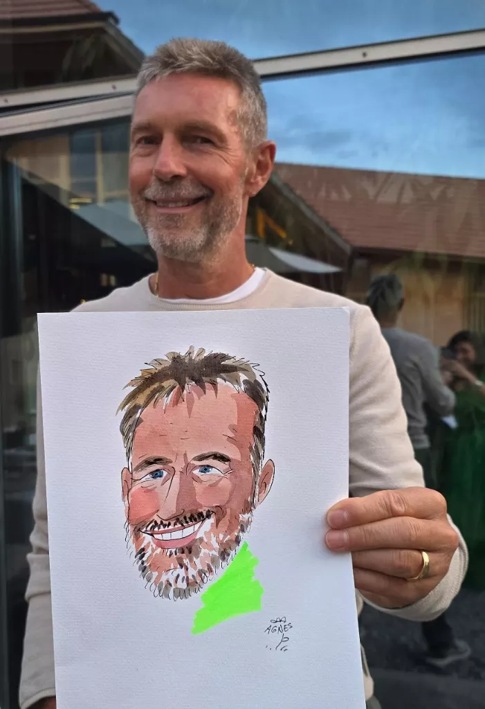 Man holding an individual portrait