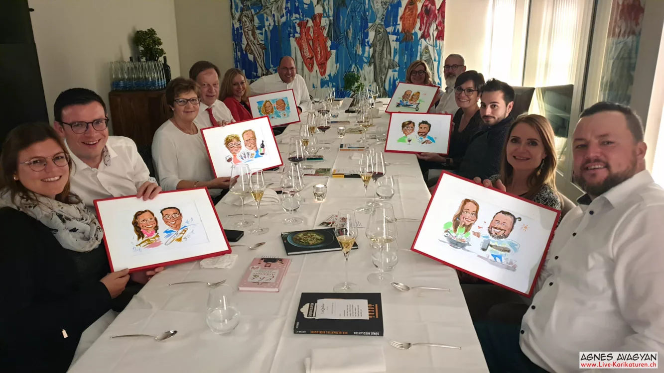 Team dinner with framed double portraits